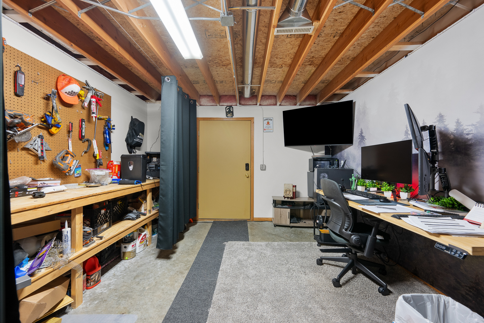 6002 Oakbrook Road Davenport, IA 52806 - Photo 47 of 50 a view of a workspace with furniture and a window
