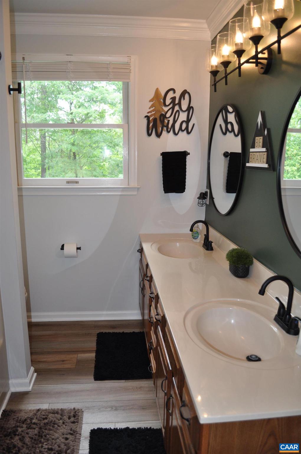 3257 Martin Kings Road Charlottesville, VA 22902 - Photo 33 of 49 a bathroom with a sink and a mirror