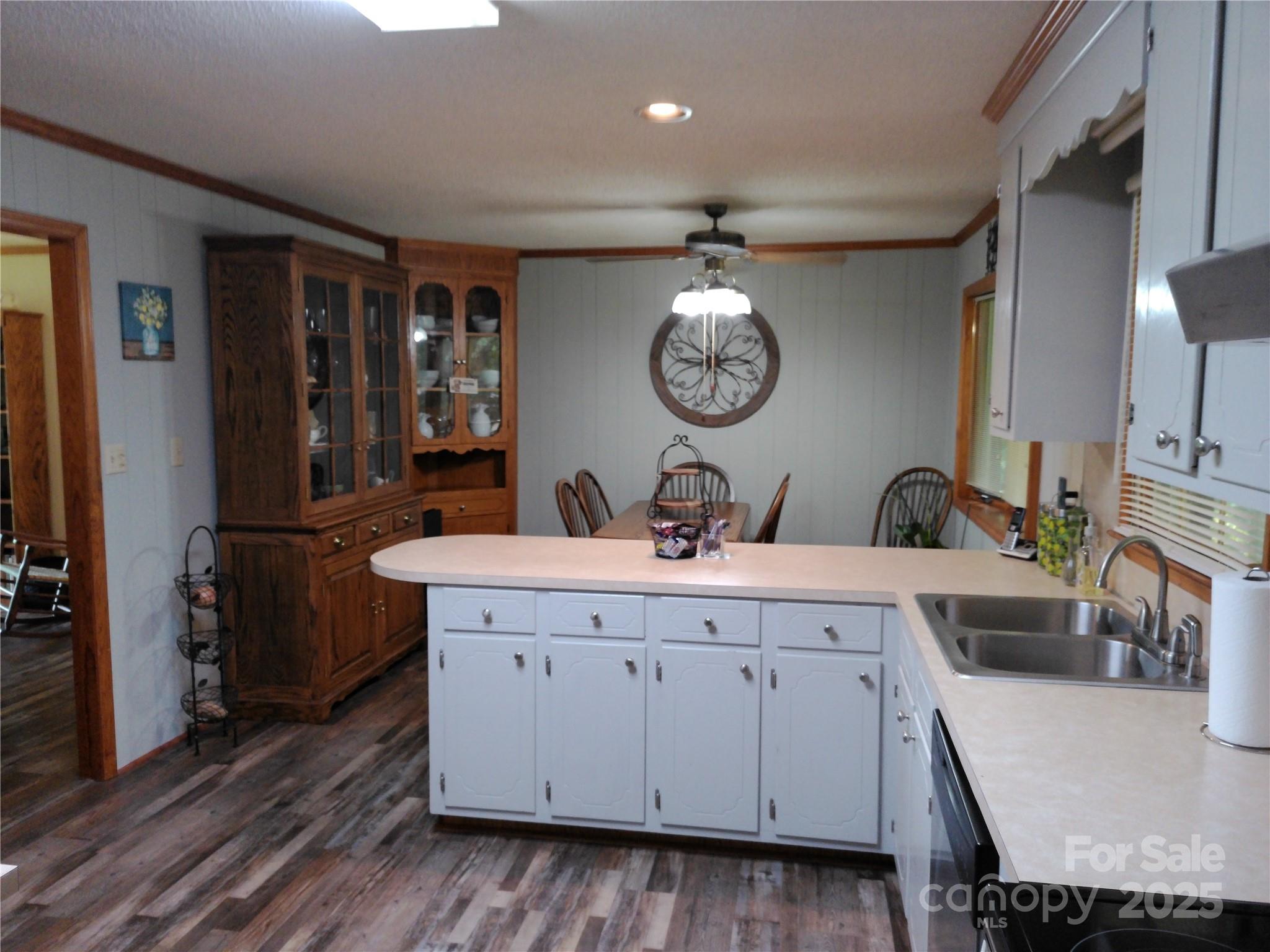 216 Williams Road Harrisburg, NC 28075 - Photo 14 of 28 a room with a sink and a clock