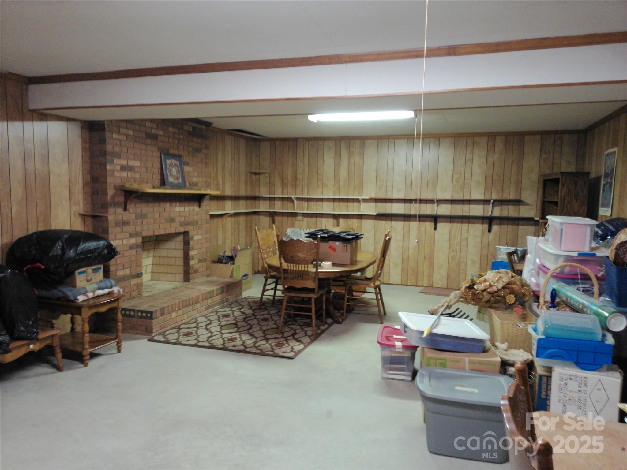 216 Williams Road Harrisburg, NC 28075 - Photo 22 of 28 a living room with furniture and a fireplace