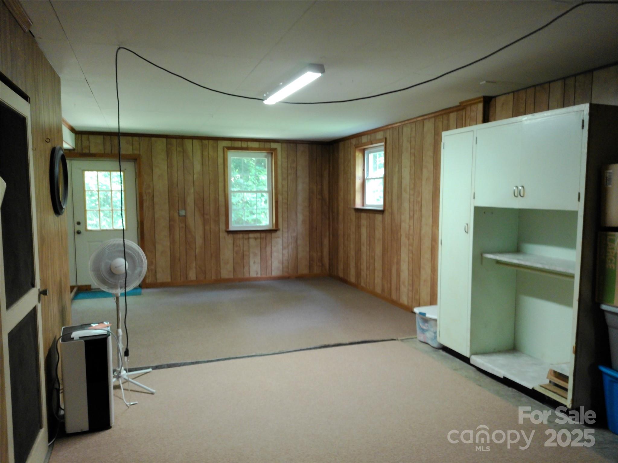 216 Williams Road Harrisburg, NC 28075 - Photo 24 of 28 a view of livingroom with furniture and windows