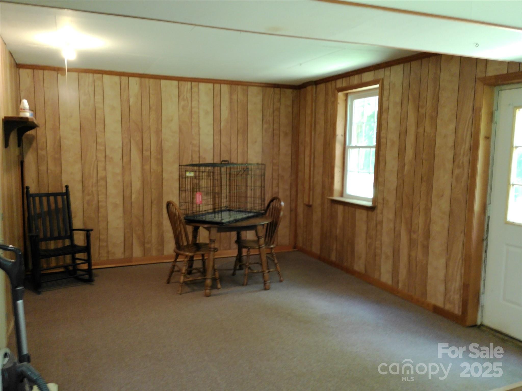 216 Williams Road Harrisburg, NC 28075 - Photo 26 of 28 a view of a room with furniture and windows