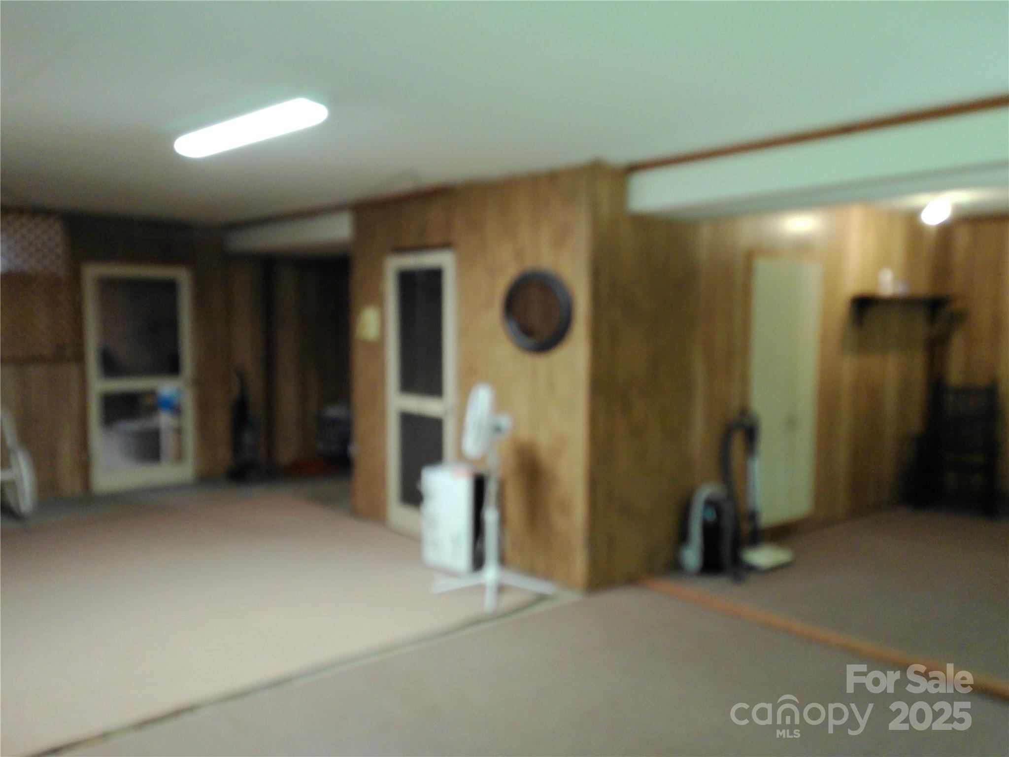 216 Williams Road Harrisburg, NC 28075 - Photo 27 of 28 a view of an empty room with a fireplace