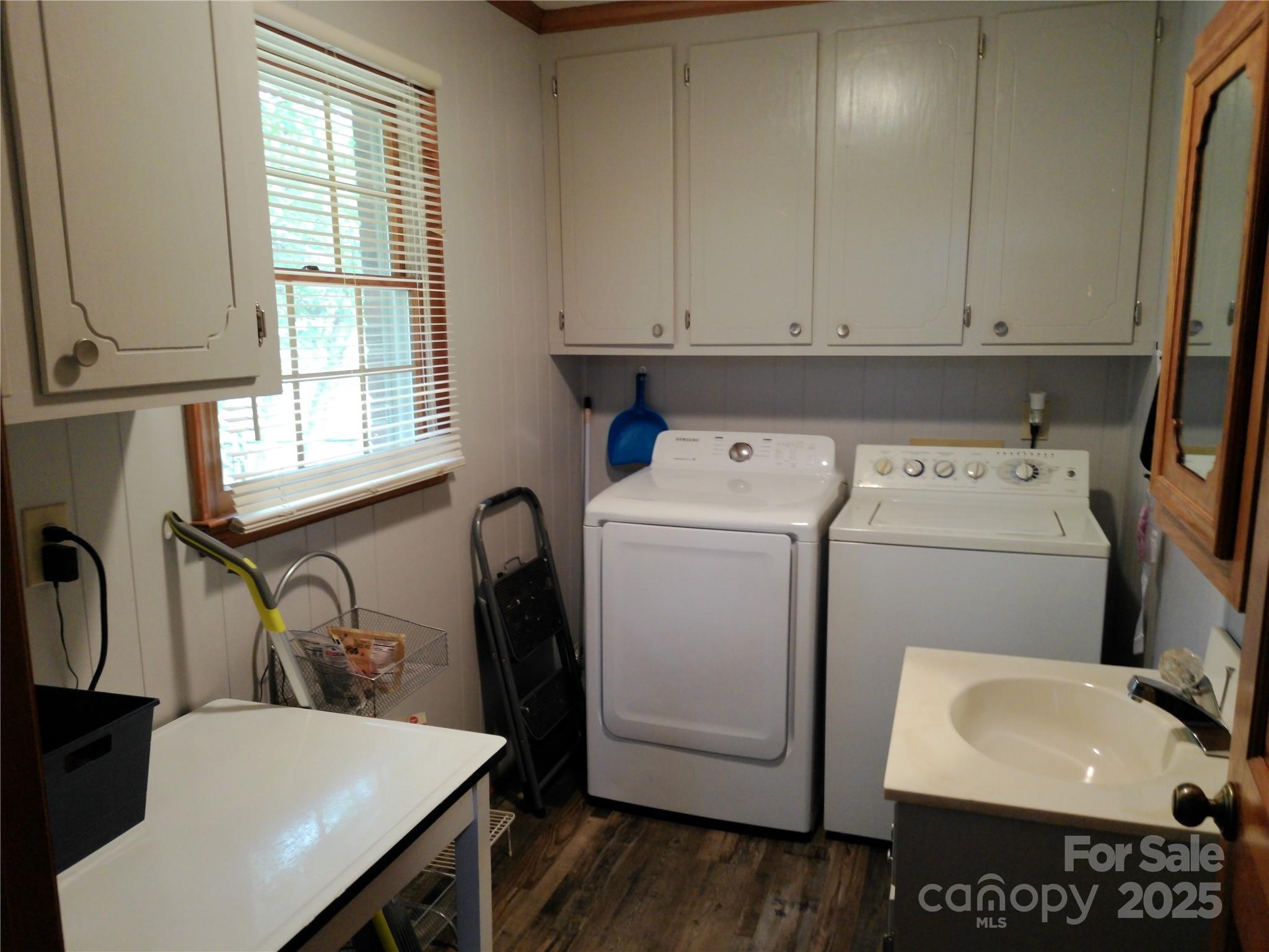 216 Williams Road Harrisburg, NC 28075 - Photo 28 of 28 a utility room with dryer and washer