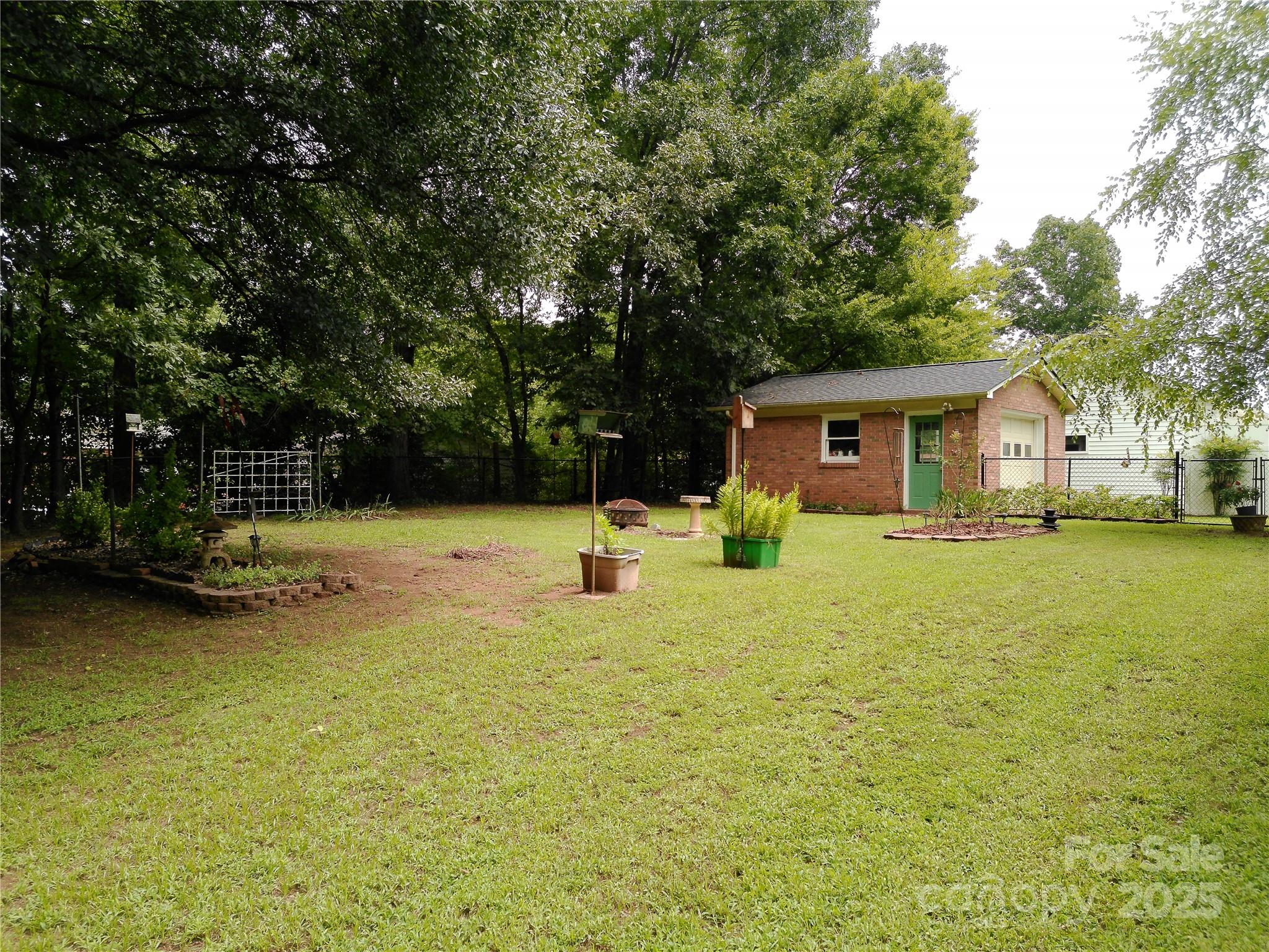 216 Williams Road Harrisburg, NC 28075 - Photo 5 of 28 a view of house with swimming pool