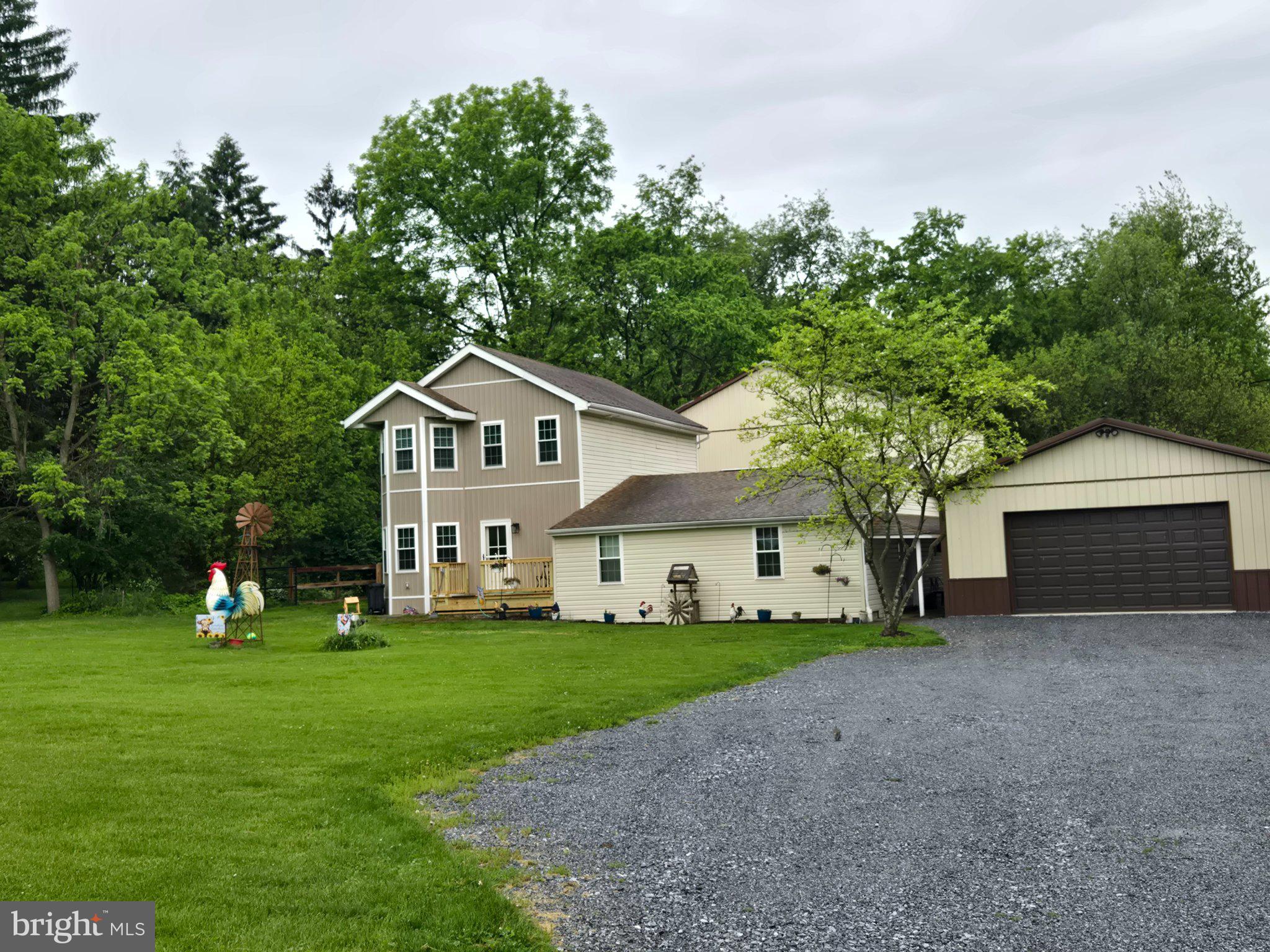 1669 Colebrook Road Lebanon, PA 17042 - Photo 29 of 34 a front view of a house with a yard and trees