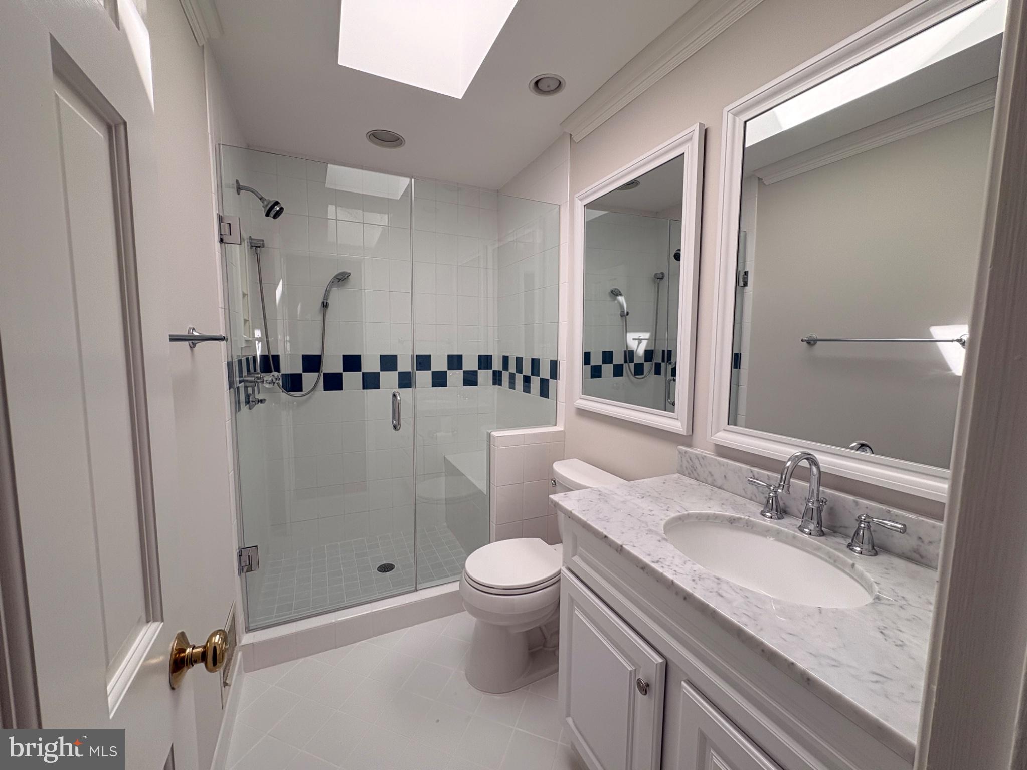 911 Rail Court McLean, VA 22102 - Photo 13 of 23 Hall bath with sleek design
