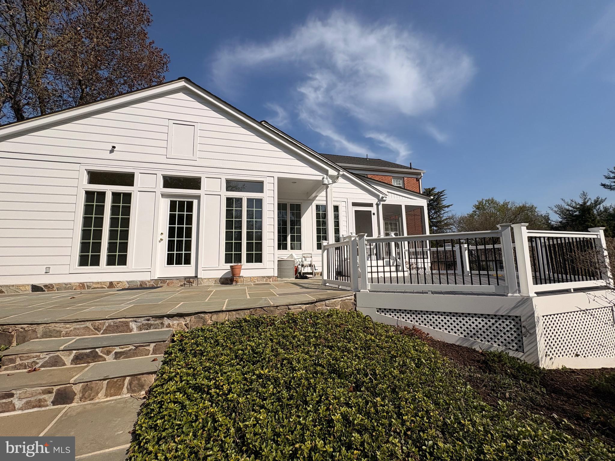 911 Rail Court McLean, VA 22102 - Photo 3 of 23 Sunroom opens to flagstone patio