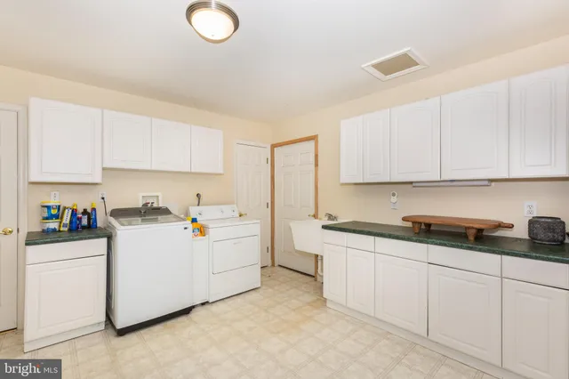 a backyard of a house with seating space and sitting area