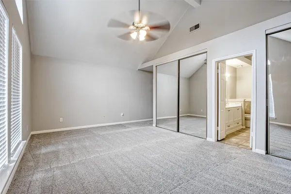 a bathroom with a sink mirror toilet and bathtub
