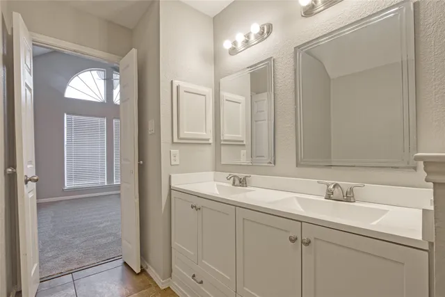 a view of a house with a small yard