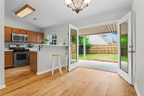 a view of livingroom with furniture wooden floor and window