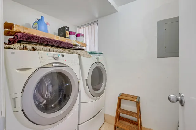 a utility room with dryer and washer