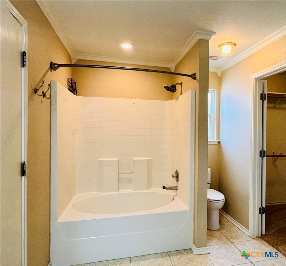 8210 Sunset Trail Temple, TX 76502 - Photo 10 of 15 a bathroom with a bathtub a toilet and a shower