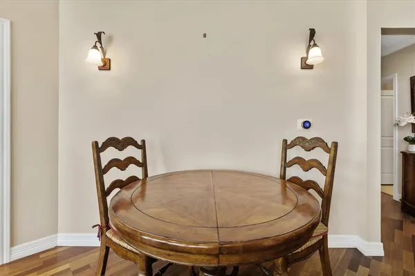 a view of walk in closet with window and furniture