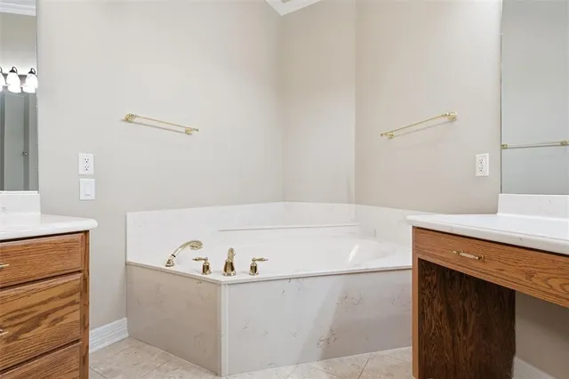 a bathroom with a bathtub and a sink