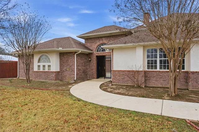 a front view of a house with entertaining space
