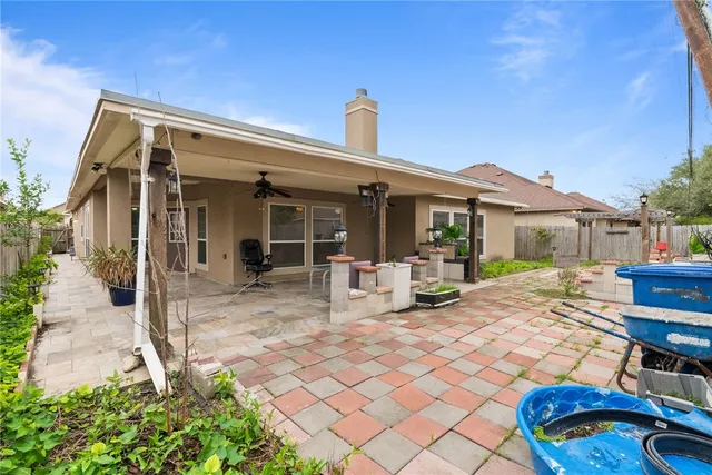 a front view of a house with patio