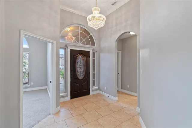 a view of a hallway with washer and dryer