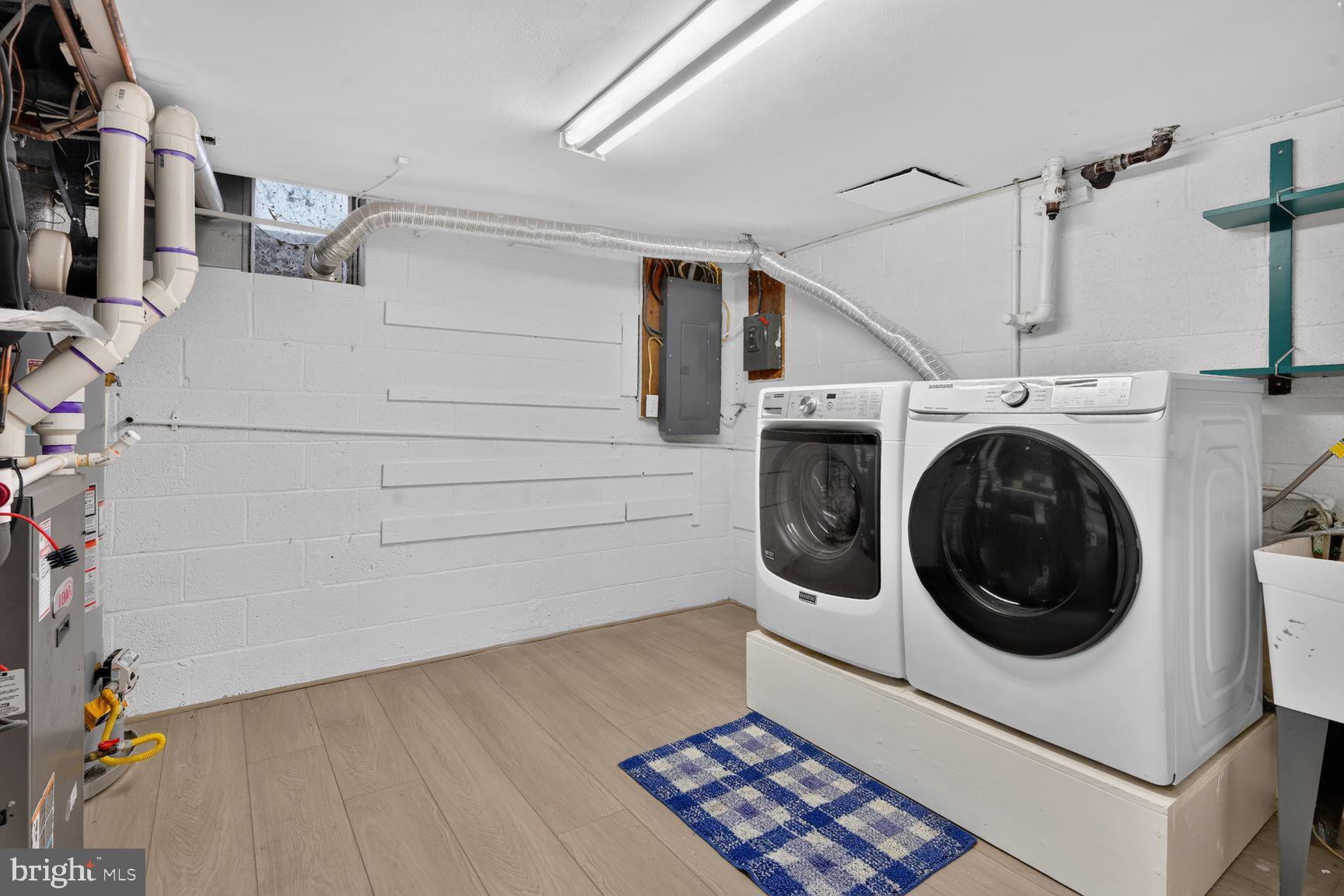 4605 Reno Road Northwest Washington, DC 20008 - Photo 45 of 49 a utility room with dryer and washer