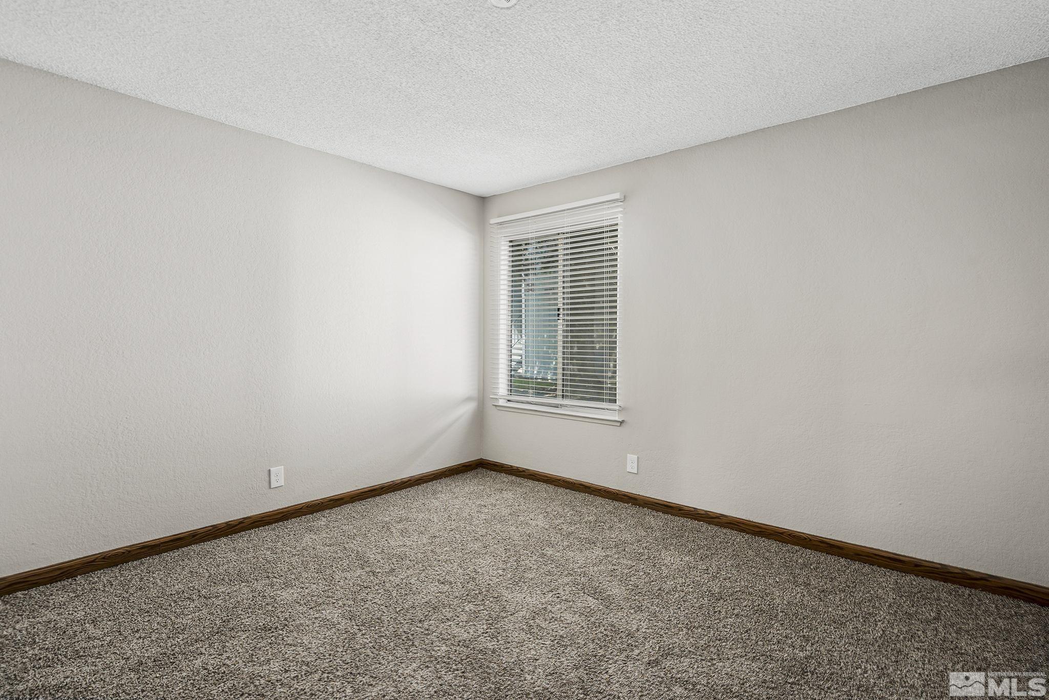 4600 Neil Road, Unit 3 Reno, NV 89502 - Photo 11 of 14 an empty room with windows
