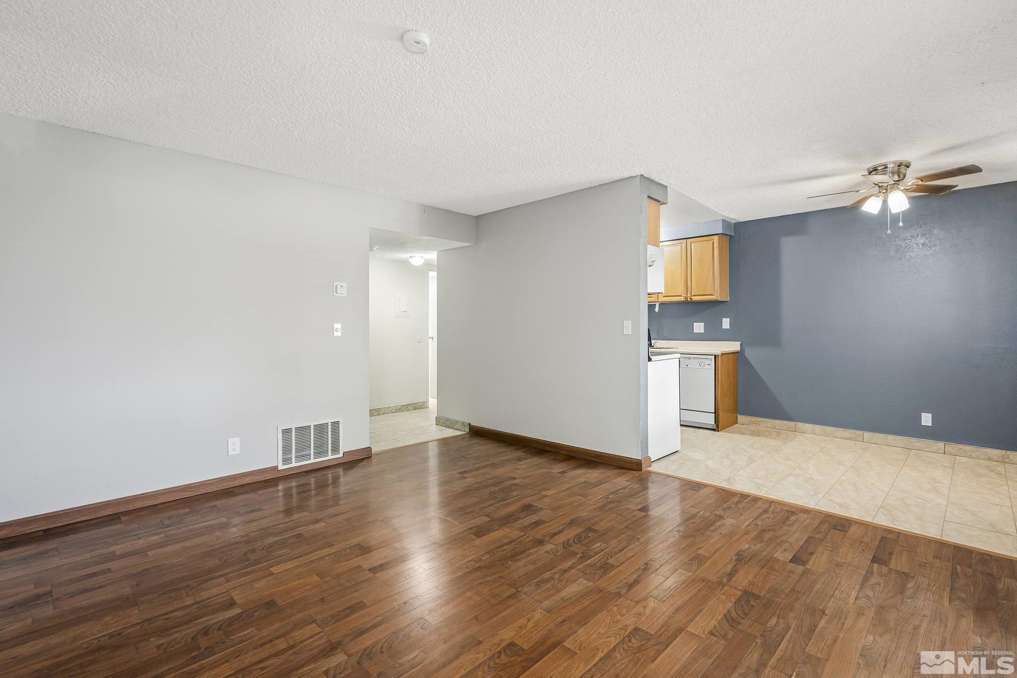4600 Neil Road, Unit 3 Reno, NV 89502 - Photo 3 of 14 a view of empty room with wooden floor