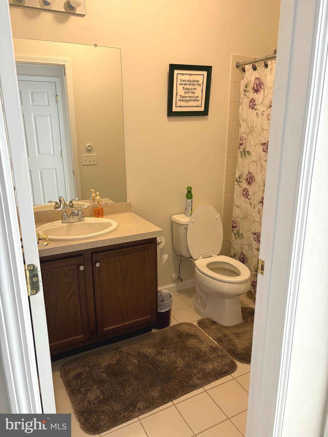 525 Timberlake Drive Ewing, NJ 08618 - Photo 11 of 27 a bathroom with a sink a toilet and shower