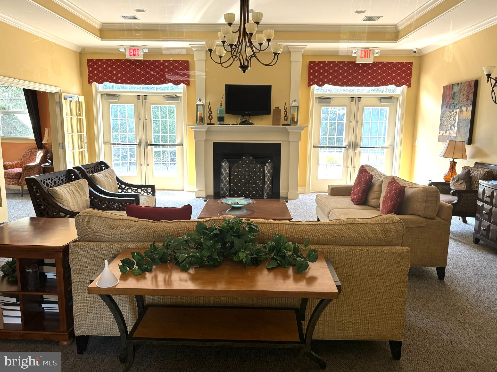525 Timberlake Drive Ewing, NJ 08618 - Photo 17 of 27 a living room with furniture and a fireplace