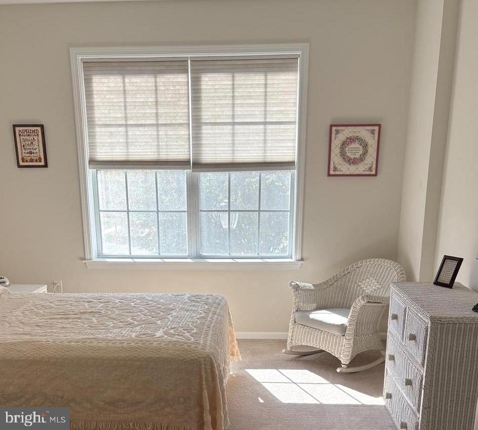 525 Timberlake Drive Ewing, NJ 08618 - Photo 3 of 27 a bedroom with a bed and wooden floor