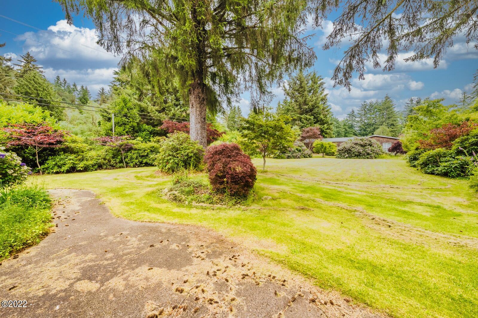 2420 North North Bank Road Otis, OR 97368 - Photo 2 of 30 2420 Yard
