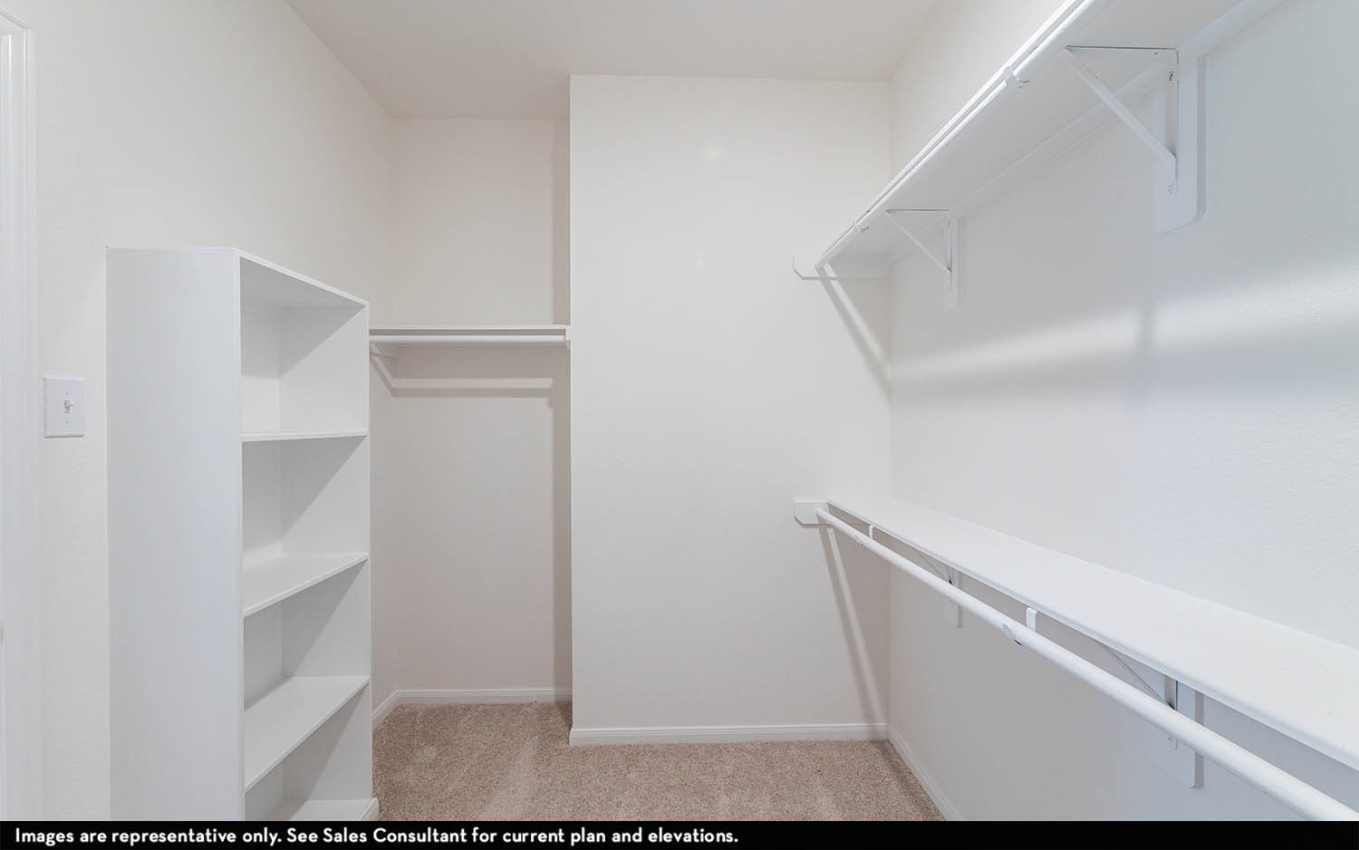 418 Monarch Trail Huntsville, TX 77340 - Photo 11 of 17 a view of walk in closet with empty racks