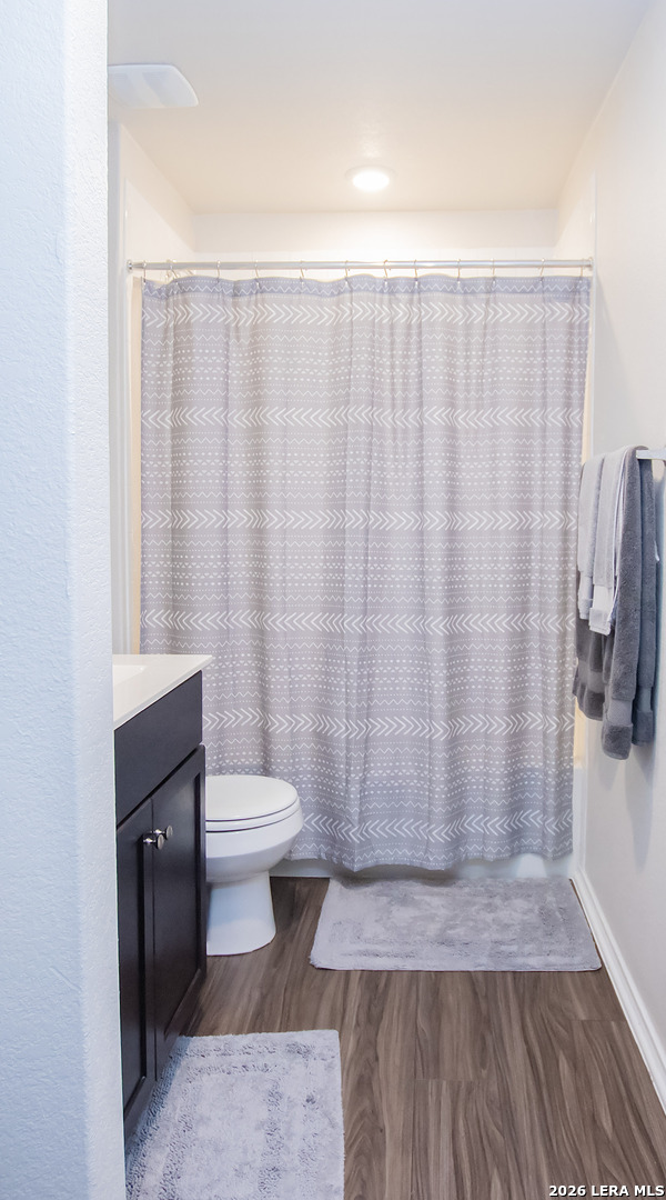 837 Indigo Way Seguin, TX 78155 - Photo 12 of 23 a bathroom with a sink and a toilet