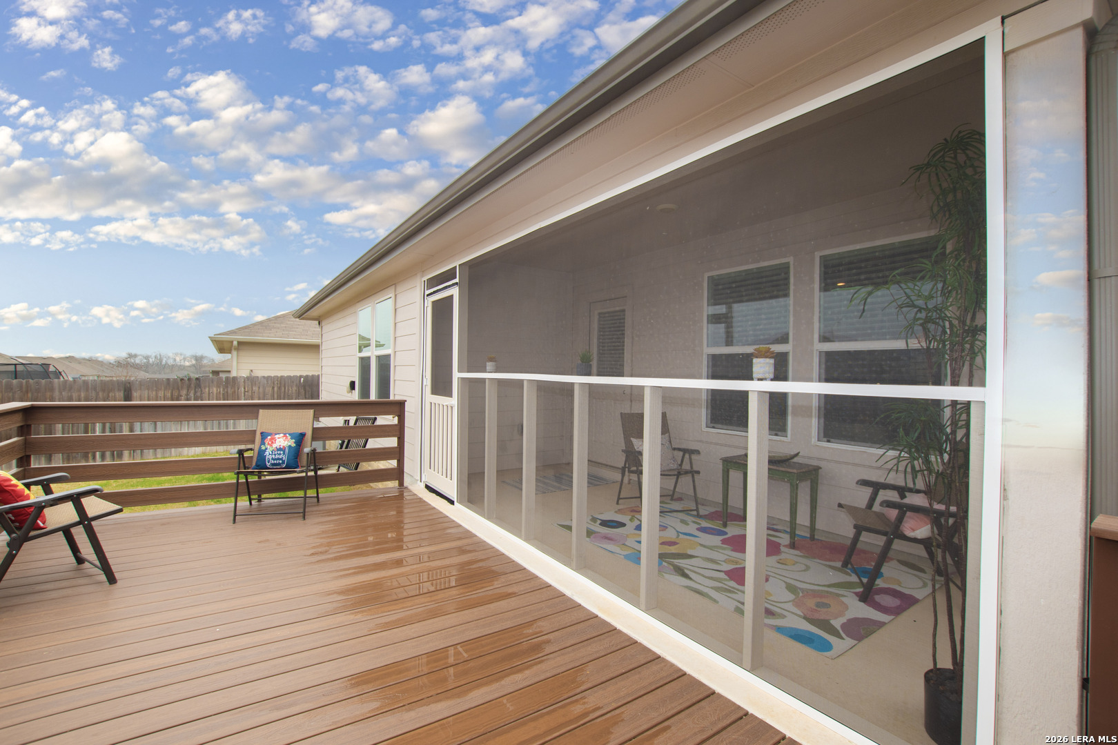 837 Indigo Way Seguin, TX 78155 - Photo 19 of 23 a balcony with chairs and wooden floor