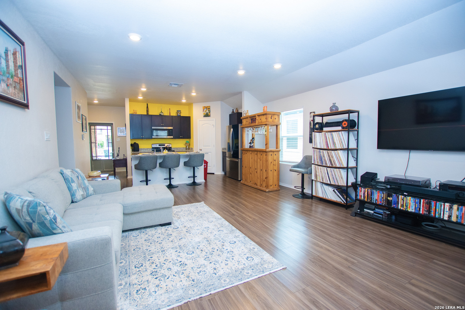 837 Indigo Way Seguin, TX 78155 - Photo 7 of 23 a living room with furniture and a flat screen tv