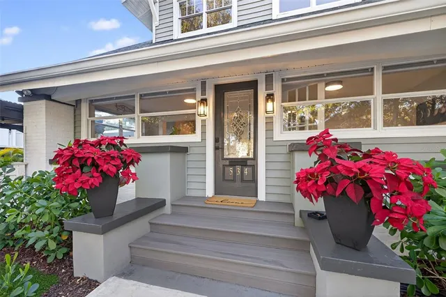a workspace with furniture window and wooden floor