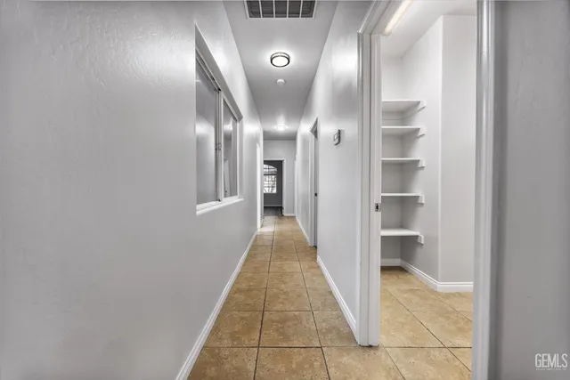 a view of gallery with windows