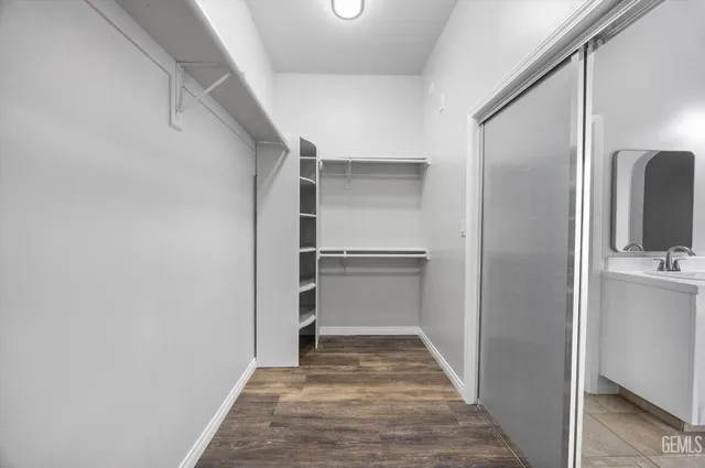 a view of a kitchen from the hallway