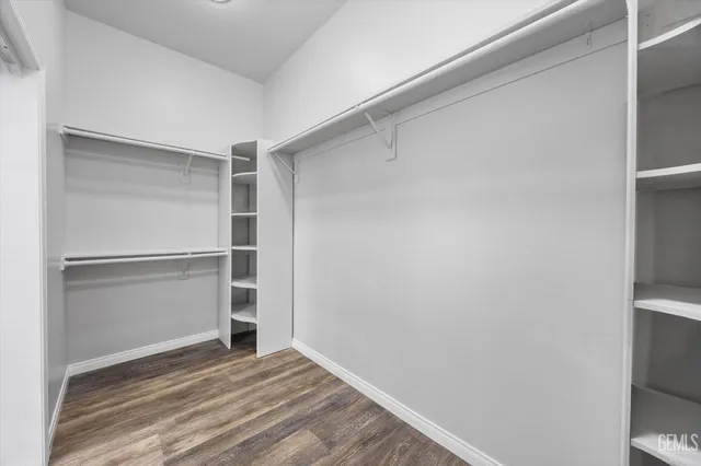 a view of an empty walk in closet
