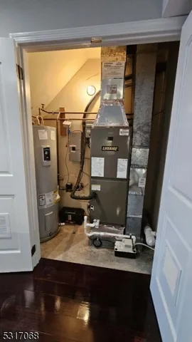 a view of a brick house with many windows