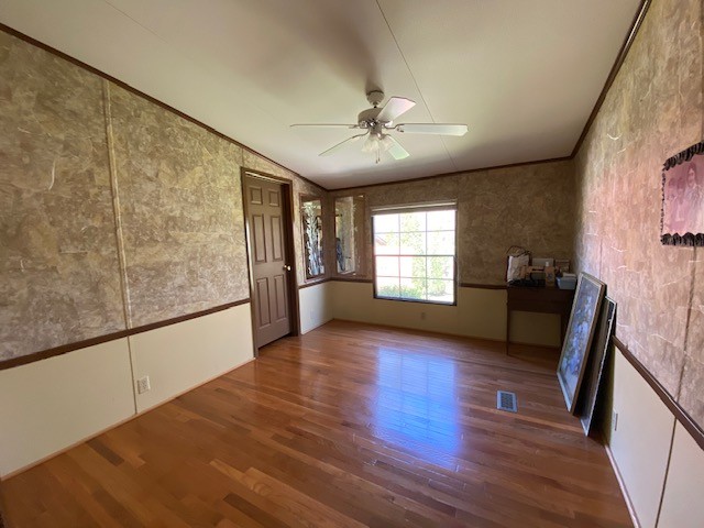751 Monroe Floyd Road Decherd, TN 37324 - Photo 14 of 38 a view of an empty room with a window and wooden floor