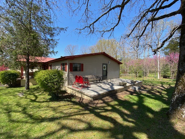 751 Monroe Floyd Road Decherd, TN 37324 - Photo 17 of 38 a view of backyard of house