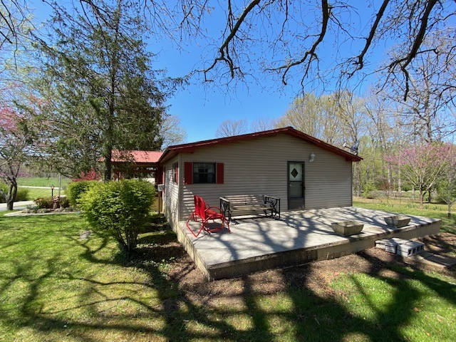 751 Monroe Floyd Road Decherd, TN 37324 - Photo 18 of 38 a view of outdoor space yard and patio