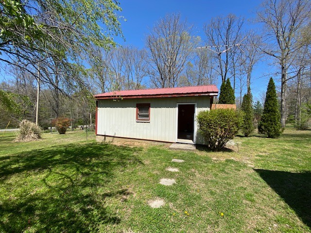 751 Monroe Floyd Road Decherd, TN 37324 - Photo 22 of 38 a view of a house with a yard