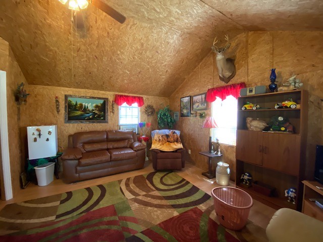 751 Monroe Floyd Road Decherd, TN 37324 - Photo 25 of 38 a living room with furniture and a chandelier