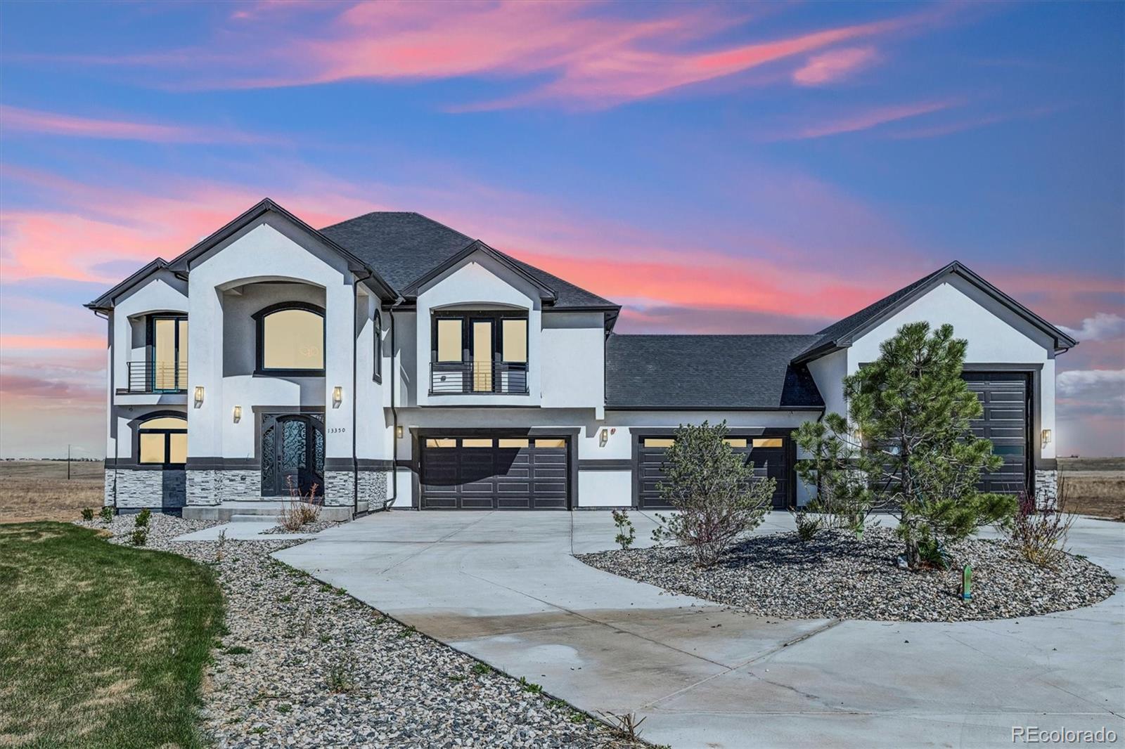 13350 Imboden Road Hudson, CO 80642 - Photo 50 of 50 a front view of a house with garden