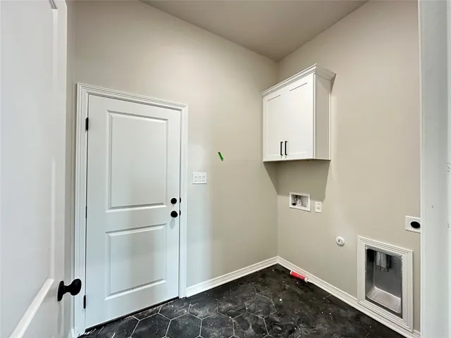 a room with a wooden door