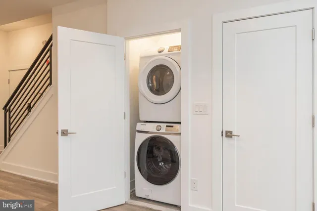 a utility room with dryer and washer