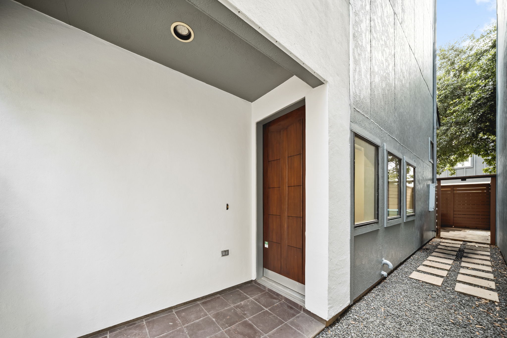 2010 Blodgett Street, Unit G Houston, TX 77004 - Photo 20 of 31 a view of a porch with wooden floor and stairs