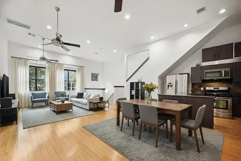 a view of a dining room with furniture