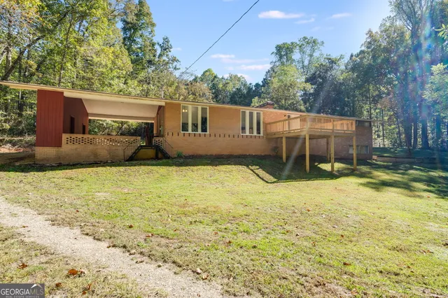 a house view with a backyard space